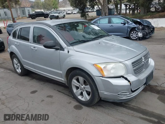 ✅ 2010 Dodge Caliber SXT • VIN: 1B3CB4HA2AD656627 • Lot: 42115079. Listed on IAAI with 185,936 mi. Free auction sales archive from the USA and detailed vehicle history report at DreamBid. Image 1.