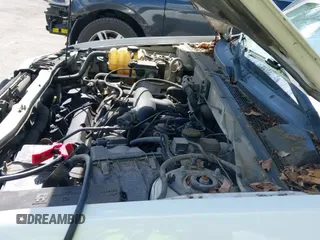 ✅ 2004 Ford Escape XLS • VIN: 1FMYU02184KA89044 • Lot: 43033932. Listed on IAAI with 211,537 mi. Free auction sales archive from the USA and detailed vehicle history report at DreamBid. Image 13.