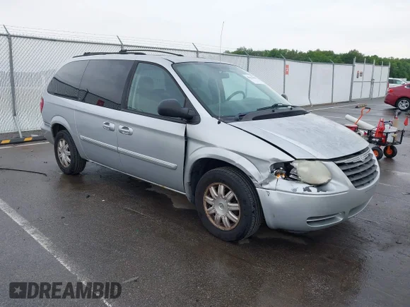 ✅ 2007 Chrysler Town & Country Touring • VIN: 2A4GP54L97R304286 • Лот: 45024488. Опубликован ранее на IAAI с пробегом 99 189 миль. Бесплатный доступ к архиву аукционных продаж из США и подробный отчёт об истории автомобиля на DreamBid. Изображение 1.
