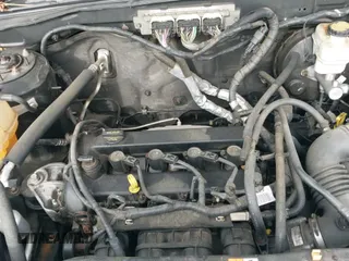 2009 Mercury Mariner Premier with VIN 4M2CU977X9KJ10414, listed as a IAAI auction lot 41880499 with 175,988 mi miles and . Bid and sale history available at DreamBid. Image 12.