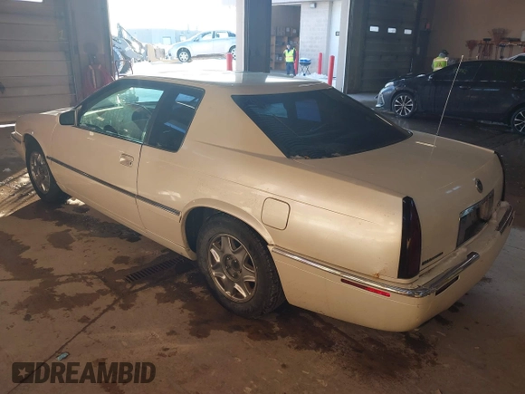✅ 2000 Cadillac Eldorado ESC • VIN: 1G6EL12Y4YB704906 • Lot: 43847877. Listed on IAAI with 200,869 mi. Free auction sales archive from the USA and detailed vehicle history report at DreamBid. Image 3.