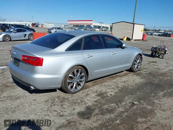 ✅ 2014 Audi A6 Premium Plus • VIN: WAUGFAFCXEN087496 • Лот: 41417074. Опубліковано раніше на IAAI з пробігом 127 614 миль. Безкоштовний доступ до архіву аукціонних продажів зі США та докладний звіт про історію автомобіля на DreamBid. Зображення 4.
