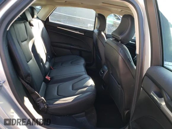 ✅ 2019 Ford Fusion Titanium • VIN: 3FA6P0RUXKR106329 • Лот: 55557282. Опубликован ранее на Copart с пробегом 40 593 миль. Бесплатный доступ к архиву аукционных продаж из США и подробный отчёт об истории автомобиля на DreamBid. Изображение 6.