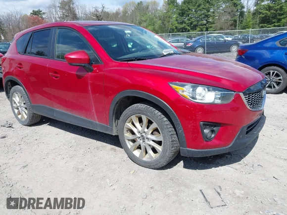 ✅ 2015 Mazda CX-5 Grand Touring • VIN: JM3KE4DY7F0447930 • Lot: 45062609. Listed on IAAI with 146,401 mi. Free auction sales archive from the USA and detailed vehicle history report at DreamBid. Image 1.