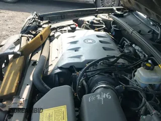 ✅ 2003 Cadillac DeVille DHS • VIN: 1G6KE54Y23U281967 • Lot: 42492680. Listed on IAAI with 61,109 mi. Free auction sales archive from the USA and detailed vehicle history report at DreamBid. Image 12.