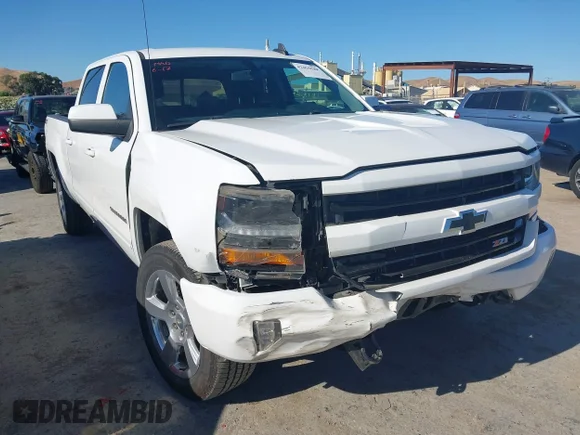 ✅ 2018 Chevrolet Silverado 1500 LT • VIN: 1GCUKRECXJF180945 • Lot: 42450588. Wystawiony na IAAI z przebiegiem 108 199 mil. Bezpłatny archiwum sprzedaży aukcyjnych z USA i szczegółowy raport historii pojazdu na DreamBid. Zdjęcie 6.