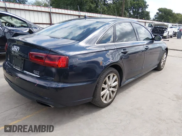 ✅ 2016 Audi A6 Premium Plus • VIN: WAUGFAFC3GN014232 • Lot: 45170408. Wystawiony na IAAI z przebiegiem 99 708 mil. Bezpłatny archiwum sprzedaży aukcyjnych z USA i szczegółowy raport historii pojazdu na DreamBid. Zdjęcie 4.
