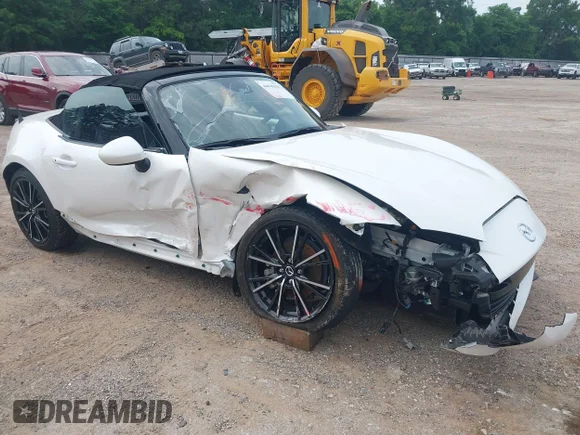 ✅ 2024 Mazda MX-5 Miata Grand Touring • VIN: JM1NDAD76R0606097 • Lot: 44947035. Wystawiony na IAAI z przebiegiem 12 909 mil. Bezpłatny archiwum sprzedaży aukcyjnych z USA i szczegółowy raport historii pojazdu na DreamBid. Zdjęcie 1.
