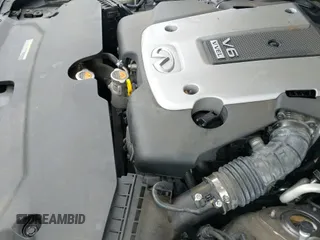 ✅ 2014 Infiniti Q50 Premium • VIN: JN1BV7AP1EM675020 • Lot: 43544795. Listed on IAAI with 106,979 mi. Free auction sales archive from the USA and detailed vehicle history report at DreamBid. Image 12.