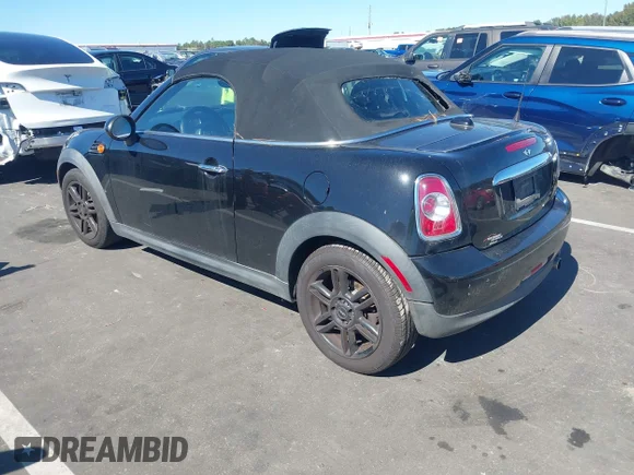 ✅ 2015 MINI Roadster • VIN: WMWSY1C56FT719787 • Lot: 43461765. Listed on IAAI with 127,722 mi. Free auction sales archive from the USA and detailed vehicle history report at DreamBid. Image 3.