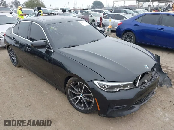 ✅ 2019 BMW 3 Series 330i • VIN: 3MW5R1J54K8A05512 • Lot: 43398382. Listed on IAAI with 84,055 mi. Free auction sales archive from the USA and detailed vehicle history report at DreamBid. Image 1.