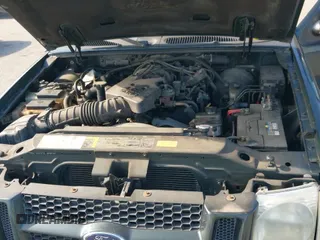 ✅ 2003 Ford Explorer Sport Trac XLS • VIN: 1FMZU77E93UA70739 • Lot: 43108981. Listed on IAAI with 112,869 mi. Free auction sales archive from the USA and detailed vehicle history report at DreamBid. Image 12.