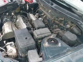 ✅ 2000 Toyota RAV4 • VIN: JT3GP10V8Y0043447 • Lot: 42658380. Listed on IAAI with 186,193 mi. Free auction sales archive from the USA and detailed vehicle history report at DreamBid. Image 13.