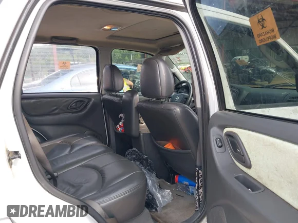 ✅ 2005 Mazda Tribute S • VIN: 4F2YZ06145KM10370 • Lot: 43166930. Wystawiony na IAAI z przebiegiem Nie podano. Bezpłatny archiwum sprzedaży aukcyjnych z USA i szczegółowy raport historii pojazdu na DreamBid. Zdjęcie 8.