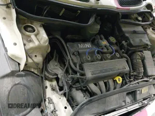 ✅ 2006 MINI Hardtop • VIN: WMWRC33506TK15034 • Lot: 42349957. Listed on IAAI with 153,596 mi. Free auction sales archive from the USA and detailed vehicle history report at DreamBid. Image 19.