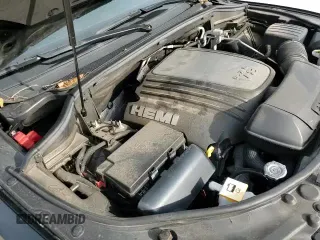 2022 Dodge Durango R/T with VIN 1C4SDHCT5NC101641, listed as a Copart auction lot 67034185 with 76,923 mi miles and Salvage title. Bid and sale history available at DreamBid. Image 14.