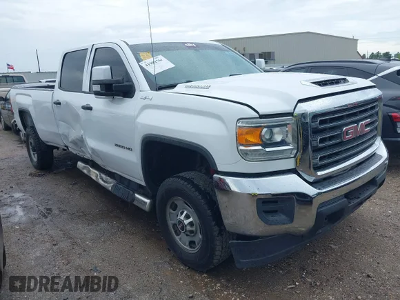 ✅ 2018 GMC Sierra 2500HD • VIN: 1GT12REY2JF256656 • Lot: 41901766. Listed on IAAI with 155,571 mi. Free auction sales archive from the USA and detailed vehicle history report at DreamBid. Image 1.