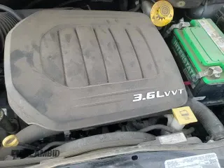 2016 Dodge Grand Caravan R/T z VIN 2C4RDGEG1GR399804, wystawiony jako Copart lot #86656344 z przebiegiem 115 356 mil mil oraz Szkoda całkowita • Salvage title. Historia ofert i sprzedaży dostępna na DreamBid. Obrazek 14.