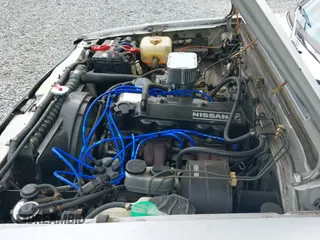 ✅ 1986 Nissan 720 • VIN: JN6ND01SXGX148116 • Lot: 42540372. Wystawiony na IAAI z przebiegiem 185 467 mil. Bezpłatny archiwum sprzedaży aukcyjnych z USA i szczegółowy raport historii pojazdu na DreamBid. Zdjęcie 20.