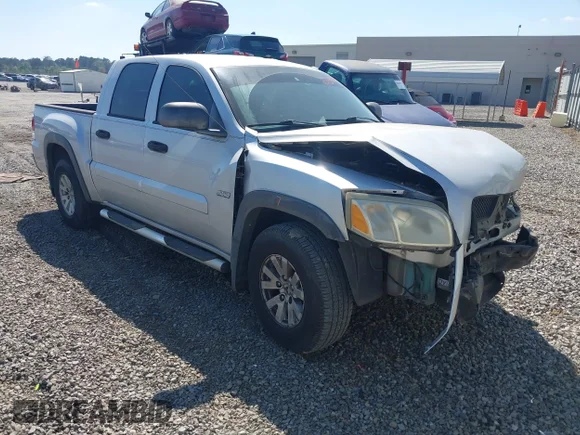 ✅ 2006 Mitsubishi Raider Duro Cross • VIN: 1Z7HC38K66S500893 • Lot: 44729410. Listed on IAAI with 252,450 mi. Free auction sales archive from the USA and detailed vehicle history report at DreamBid. Image 1.