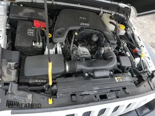 ✅ 2019 Jeep Wrangler Sport S • VIN: 1C4GJXAG1KW614085 • Lot: 62818985. Listed on Copart with 47,539 mi. Free auction sales archive from the USA and detailed vehicle history report at DreamBid. Image 16.