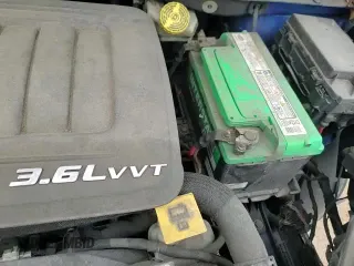 2018 Dodge Grand Caravan SXT z VIN 2C4RDGCG6JR304261, wystawiony jako Copart lot #57338335 z przebiegiem 140 506 mil mil oraz Szkoda całkowita • Salvage title. Historia ofert i sprzedaży dostępna na DreamBid. Obrazek 14.