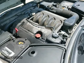 ✅ 2000 Jaguar XK • VIN: SAJJA42CXYNA06374 • Lot: 43099086. Listed on IAAI with 118,320 mi. Free auction sales archive from the USA and detailed vehicle history report at DreamBid. Image 12.