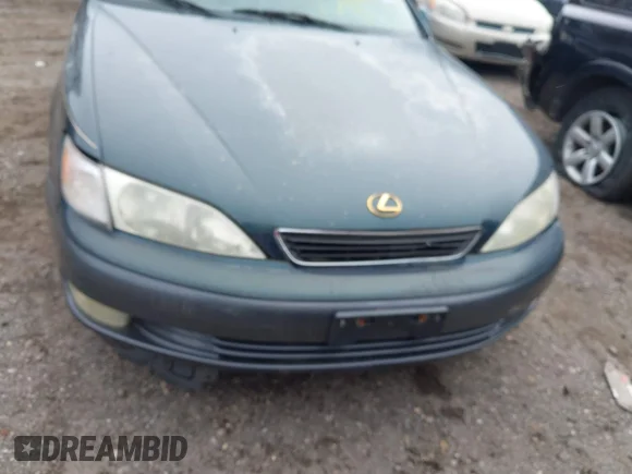 ✅ 1998 Lexus ES 300 • VIN: JT8BF28G2W5019728 • Lot: 41851823. Wystawiony na IAAI z przebiegiem Nie podano. Bezpłatny archiwum sprzedaży aukcyjnych z USA i szczegółowy raport historii pojazdu na DreamBid. Zdjęcie 6.