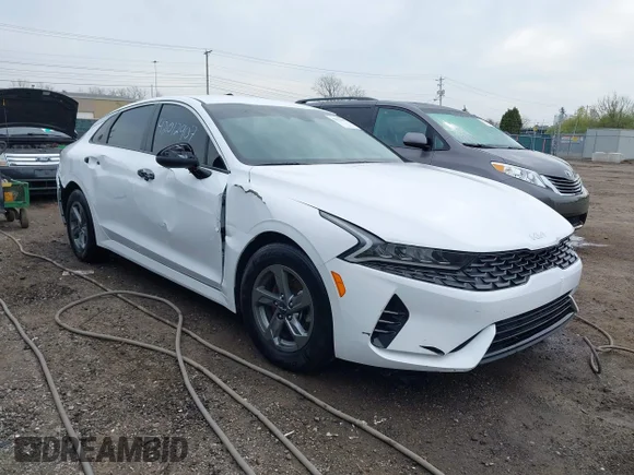 ✅ 2023 Kia K5 LXS • VIN: 5XXG14J26PG203910 • Лот: 42012907. Опубліковано раніше на IAAI з пробігом 41 949 миль. Безкоштовний доступ до архіву аукціонних продажів зі США та докладний звіт про історію автомобіля на DreamBid. Зображення 1.