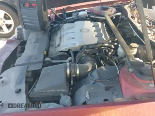 ✅ 2001 Cadillac Eldorado ESC • VIN: 1G6EL12Y41B104814 • Lot: 43107084. Listed on IAAI with 158,016 mi. Free auction sales archive from the USA and detailed vehicle history report at DreamBid. Image 13.