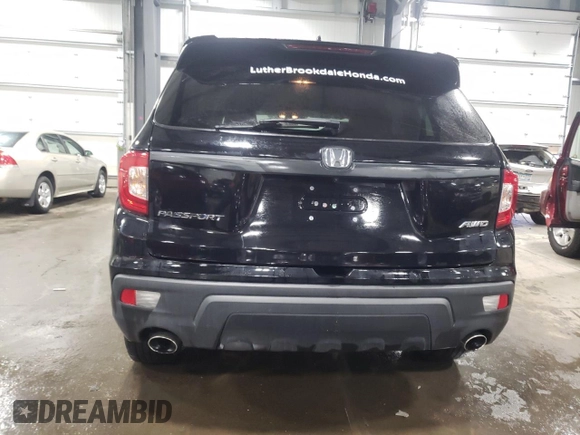 ✅ 2021 Honda Passport EX-L • VIN: 5FNYF8H59MB024627 • Lot: 40298943. Wystawiony na Copart z przebiegiem 39 970 mil. Bezpłatny archiwum sprzedaży aukcyjnych z USA i szczegółowy raport historii pojazdu na DreamBid. Zdjęcie 6.