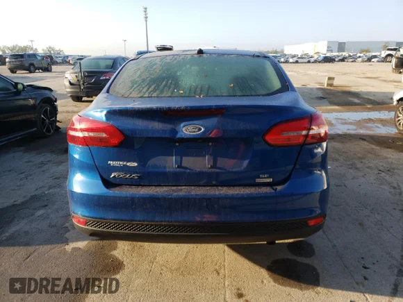 ✅ 2018 Ford Focus SE • VIN: 1FADP3FE1JL201851 • Лот: 42192703. Опубліковано раніше на Copart з пробігом 61 882 миль. Безкоштовний доступ до архіву аукціонних продажів зі США та докладний звіт про історію автомобіля на DreamBid. Зображення 6.