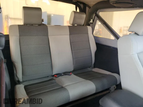 ✅ 2013 Jeep Wrangler Sport • VIN: 1C4AJWAG2DL634544 • Lot: 71602314. Wystawiony na Copart z przebiegiem 77 702 mil. Bezpłatny archiwum sprzedaży aukcyjnych z USA i szczegółowy raport historii pojazdu na DreamBid. Zdjęcie 10.