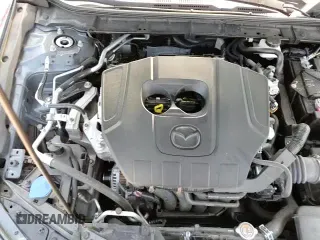 ✅ 2023 Mazda 3 S Carbon Edition • VIN: 3MZBPBCM2PM374094 • Лот: 65981855. Опубликован ранее на Copart с пробегом 9 970 миль. Бесплатный доступ к архиву аукционных продаж из США и подробный отчёт об истории автомобиля на DreamBid. Изображение 14.