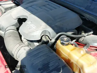 2014 Dodge Challenger SXT 100th Anniversary z VIN 2C3CDYAG1EH313481, wystawiony jako IAAI lot #42460067 z przebiegiem 209 125 mil mil oraz . Historia ofert i sprzedaży dostępna na DreamBid. Obrazek 19.