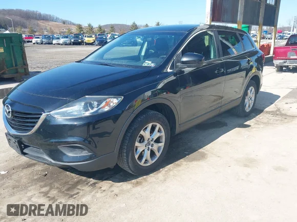 ✅ 2015 Mazda CX-9 Sport • VIN: JM3TB3BV4F0469108 • Лот: 44393481. Опубліковано раніше на IAAI з пробігом 112 585 миль. Безкоштовний доступ до архіву аукціонних продажів зі США та докладний звіт про історію автомобіля на DreamBid. Зображення 2.
