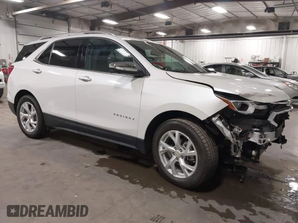 ✅ 2021 Chevrolet Equinox Premier • VIN: 3GNAXXEVXMS150913 • Lot: 45235644. Listed on IAAI with 32,084 mi. Free auction sales archive from the USA and detailed vehicle history report at DreamBid. Image 1.