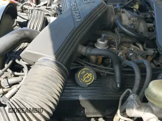 ✅ 1995 Lincoln Town Car Signature • VIN: 1LNLM82W9SY710127 • Лот: 43086194. Опубликован ранее на IAAI с пробегом 249 640 миль. Бесплатный доступ к архиву аукционных продаж из США и подробный отчёт об истории автомобиля на DreamBid. Изображение 19.