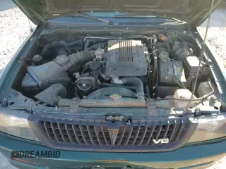 ✅ 1999 Mitsubishi Montero Sport LS • VIN: JA4LS31H5XP033598 • Lot: 85609464. Wystawiony na Copart z przebiegiem 185 686 mil. Bezpłatny archiwum sprzedaży aukcyjnych z USA i szczegółowy raport historii pojazdu na DreamBid. Zdjęcie 15.