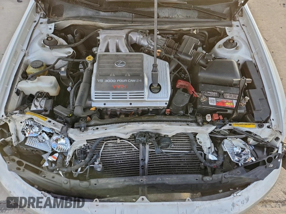 ✅ 2000 Lexus ES 300 • VIN: JT8BF28G7Y0283530 • Лот: 96014835. Опубліковано раніше на Copart з пробігом 142 962 миль. Безкоштовний доступ до архіву аукціонних продажів зі США та докладний звіт про історію автомобіля на DreamBid. Зображення 11.