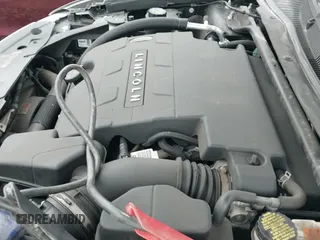 ✅ 2015 Lincoln MKS • VIN: 1LNHL9EK8FG608496 • Лот: 42347566. Опубликован ранее на IAAI с пробегом 83 946 миль. Бесплатный доступ к архиву аукционных продаж из США и подробный отчёт об истории автомобиля на DreamBid. Изображение 19.