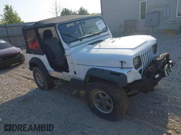 ✅ 1992 Jeep Wrangler • VIN: 2J4FY19P6NJ543626 • Lot: 42554479. Listed on IAAI with 199,826 mi. Free auction sales archive from the USA and detailed vehicle history report at DreamBid. Image 1.