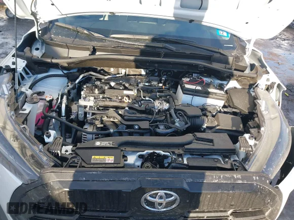 ✅ 2026 Toyota Corolla Cross LE • VIN: 7MUBAABG4TV153171 • Лот: 43977784. Опубликован ранее на IAAI с пробегом 4 366 миль. Бесплатный доступ к архиву аукционных продаж из США и подробный отчёт об истории автомобиля на DreamBid. Изображение 10.