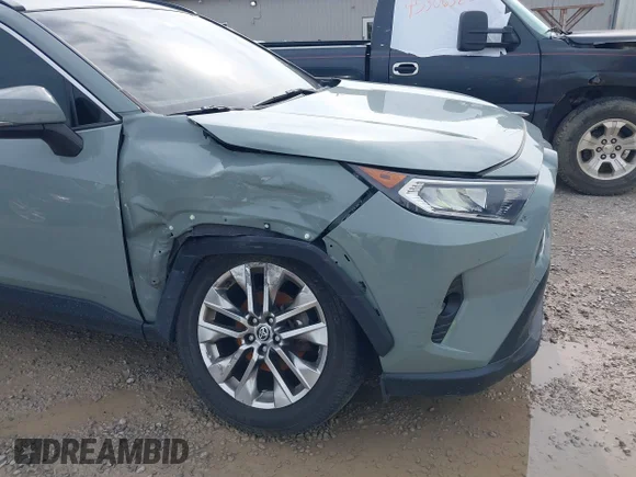 ✅ 2021 Toyota RAV4 XLE Premium • VIN: JTMA1RFV8MD070675 • Lot: 45257892. Wystawiony na IAAI z przebiegiem 127 261 mil. Bezpłatny archiwum sprzedaży aukcyjnych z USA i szczegółowy raport historii pojazdu na DreamBid. Zdjęcie 6.