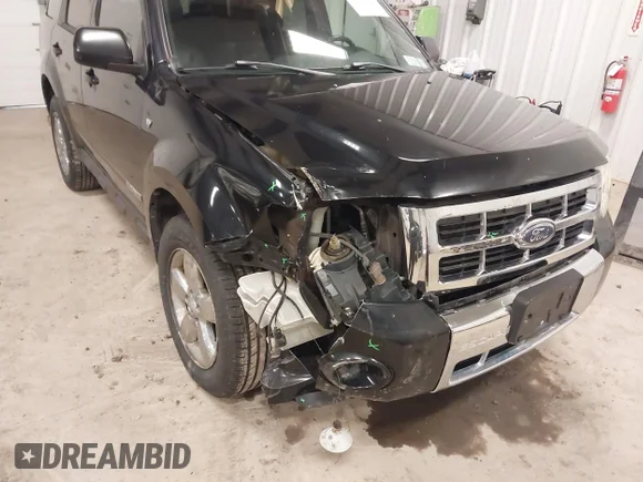 ✅ 2008 Ford Escape Limited • VIN: 1FMCU04198KE22459 • Lot: 44756348. Wystawiony na IAAI z przebiegiem 145 568 mil. Bezpłatny archiwum sprzedaży aukcyjnych z USA i szczegółowy raport historii pojazdu na DreamBid. Zdjęcie 6.