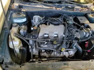 2000 Chevrolet Malibu LS z VIN 1G1NE52J9Y6223472, wystawiony jako Copart lot #84031724 z przebiegiem 230 453 mil mil oraz Czysty tytuł • Clean title. Historia ofert i sprzedaży dostępna na DreamBid. Obrazek 13.