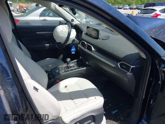 ✅ 2021 Mazda CX-5 Touring • VIN: JM3KFBCM1M1309694 • Lot: 45205495. Wystawiony na IAAI z przebiegiem 60 453 mil. Bezpłatny archiwum sprzedaży aukcyjnych z USA i szczegółowy raport historii pojazdu na DreamBid. Zdjęcie 5.