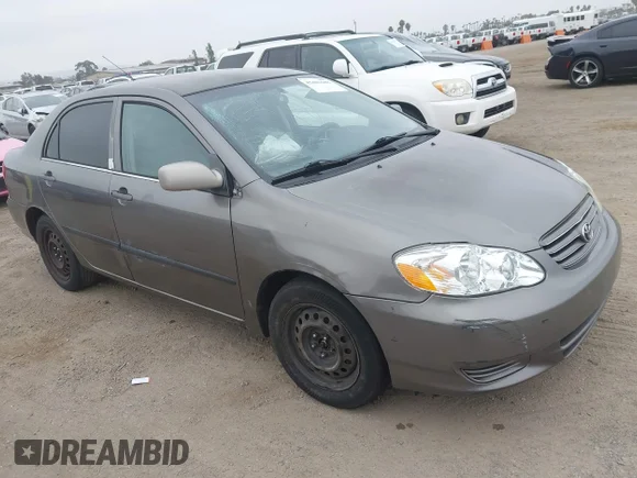 ✅ 2003 Toyota Corolla LE • VIN: 1NXBR32E73Z098347 • Lot: 45401688. Listed on IAAI with 188,287 mi. Free auction sales archive from the USA and detailed vehicle history report at DreamBid. Image 1.