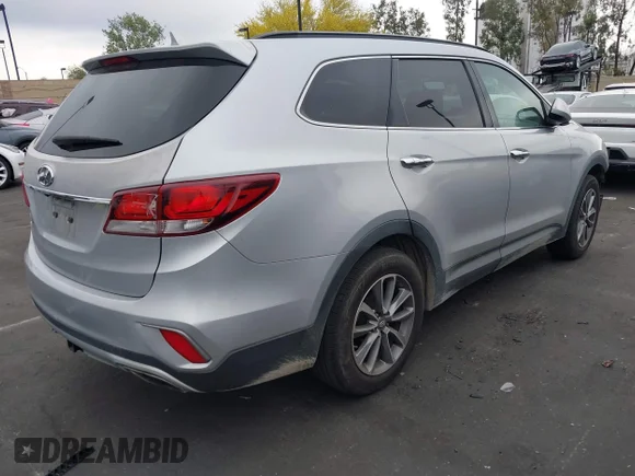 ✅ 2017 Hyundai Santa Fe SE • VIN: KM8SM4HF2HU180899 • Lot: 44753402. Listed on IAAI with 132,019 mi. Free auction sales archive from the USA and detailed vehicle history report at DreamBid. Image 4.