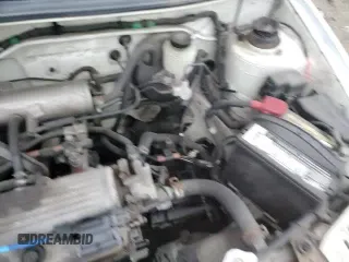 ✅ 1999 Suzuki Swift • VIN: 2S2AB21H7X6601458 • Lot: 85911934. Listed on Copart with 137,639 mi. Free auction sales archive from the USA and detailed vehicle history report at DreamBid. Image 13.